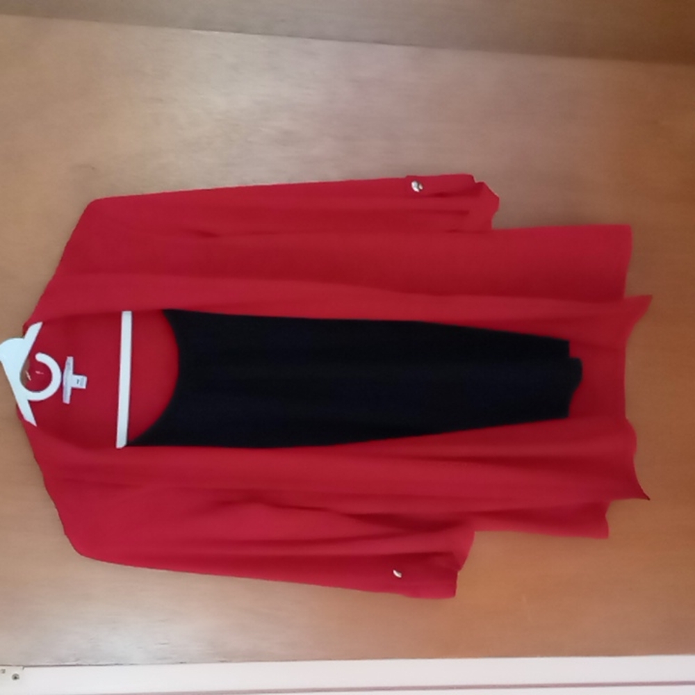 Notations one piece top. Perfect for dress up or casual wear.